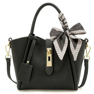 Black leather women's handbag with gold lock and scarf handle detail, stylish hobo bag.
