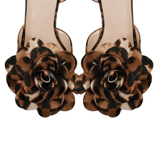 High heels for women in brown leopard print with floral embellishments, perfect for bold fashion statements.