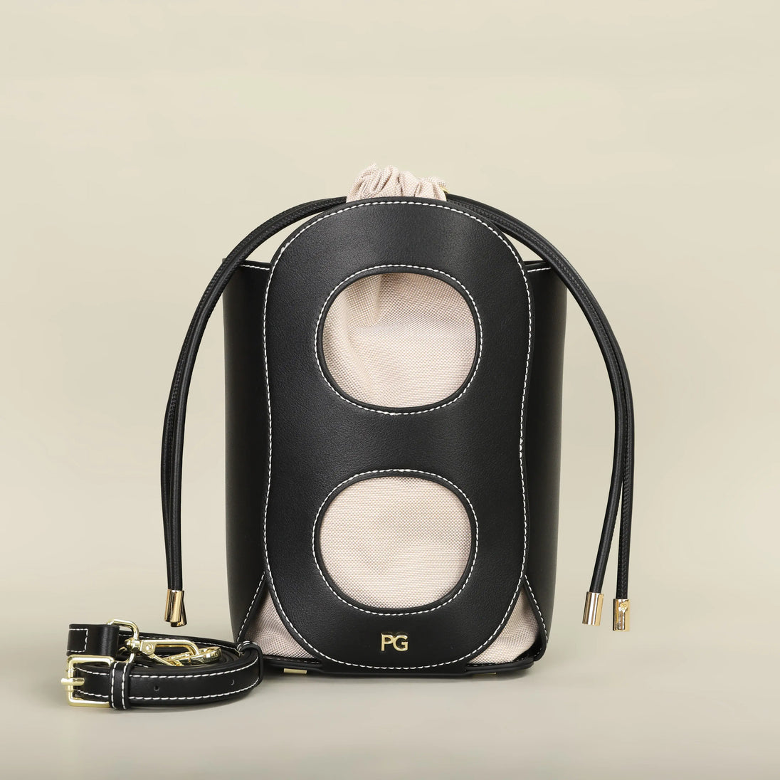 Black Women's Hollow-Out Bucket Bag, elegant geometric design, ideal for summer parties and casual outings.