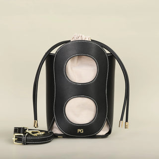 Black Women's Hollow-Out Bucket Bag, elegant geometric design, ideal for summer parties and casual outings.