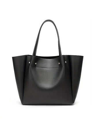 Women's large black tote bag in faux leather with minimalist design for casual occasions.