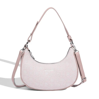 Women’s Leather Half Moon Bag in pink, soft PU material, stylish shoulder bag with tassel decoration.