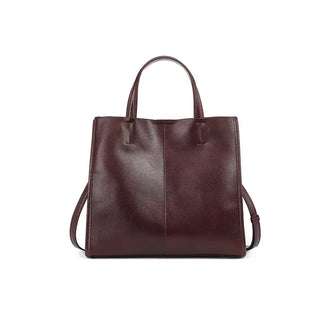 Leather handbag, burgundy structured satchel, elegant crossbody bag for casual and formal occasions.