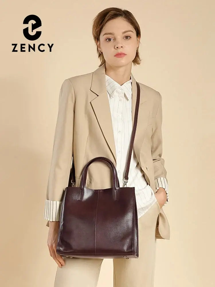 Structured burgundy leather handbag for elegant casual or formal wear with shoulder and crossbody options.