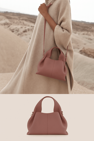 Hobo shoulder bag in a modern design, showcasing a relaxed silhouette and charol material, worn with a stylish outfit.