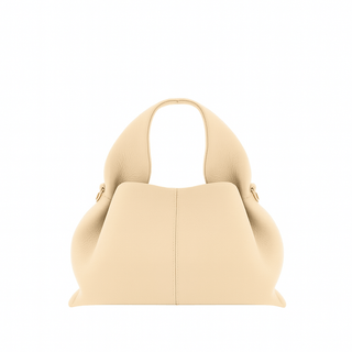 Hobo shoulder bag with modern design in beige charol material, showcasing a trendy relaxed silhouette.
