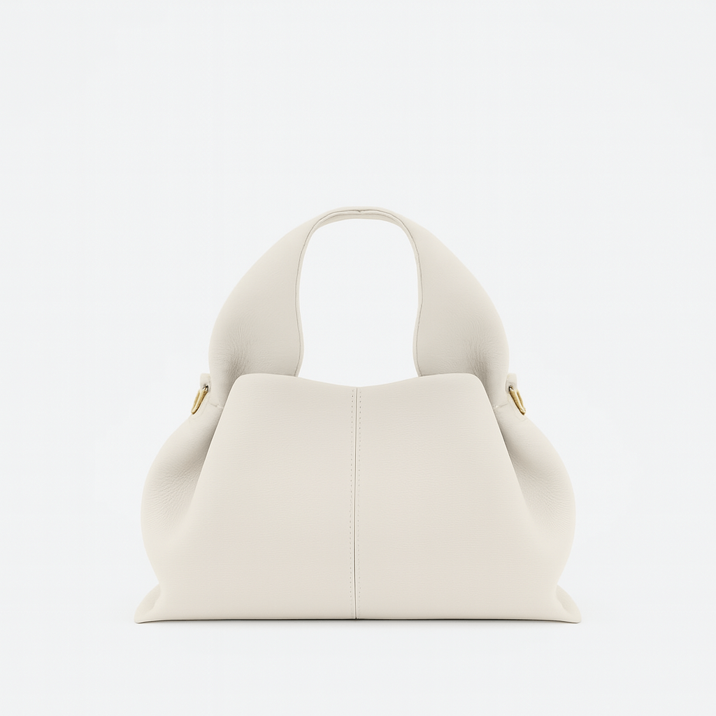 Hobo shoulder bag with modern design and durable charol material, featuring a relaxed silhouette in white.