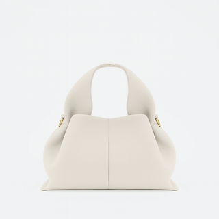 Hobo shoulder bag with modern design and durable charol material, featuring a relaxed silhouette in white.