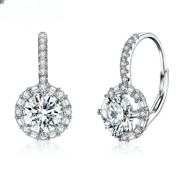 Women's moissanite hoop earrings in sterling silver, featuring 1.0ct round stones and zircon accents for elegance.