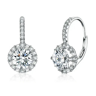 Moissanite hoop earrings in silver featuring brilliant round stones and zircon accents, perfect for elegant accessorizing.