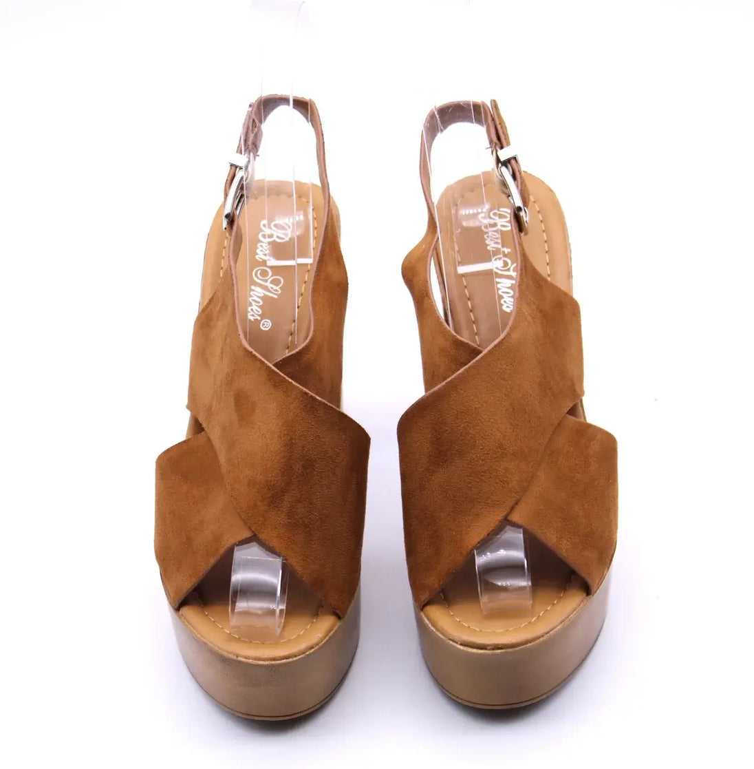 Brown platform sandals for women with cross strap design, offering style and comfort.