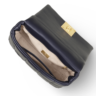 Women’s navy PU leather messenger bag interior view with gold-tone closure and zip pocket.
