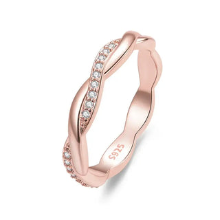 Women's rose gold sterling silver twist band ring with crystal accents, perfect for engagement or anniversary.