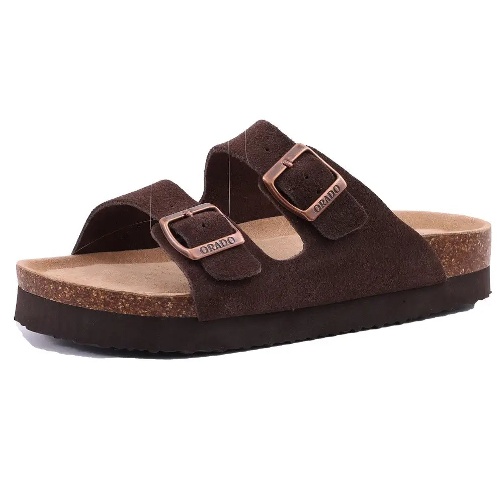 Brown suede sandals Arizona with buckles, featuring flat cork sole and casual slip-on design for comfort and style.