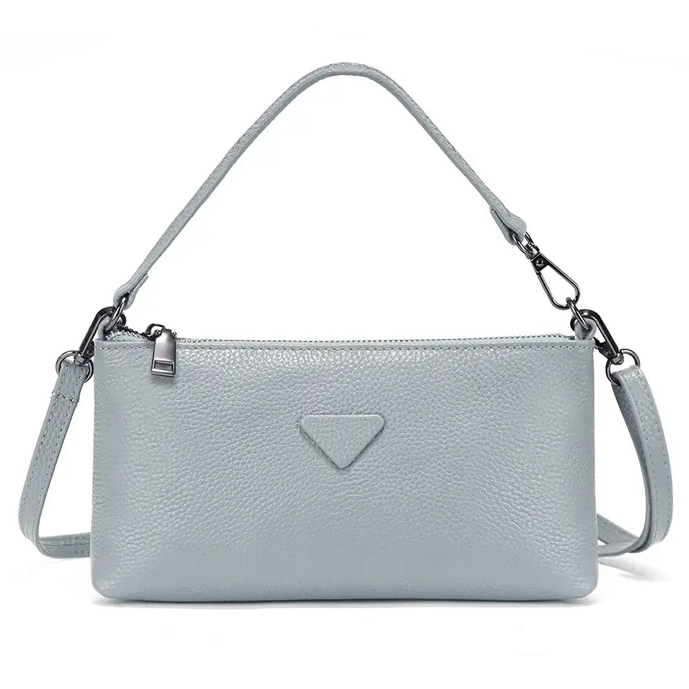 Shoulder bag in light gray leather, sleek design perfect for casual and formal occasions.