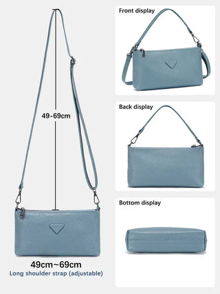 Shoulder Bag Leather in light blue, adjustable strap, sleek envelope-style for everyday and formal use.
