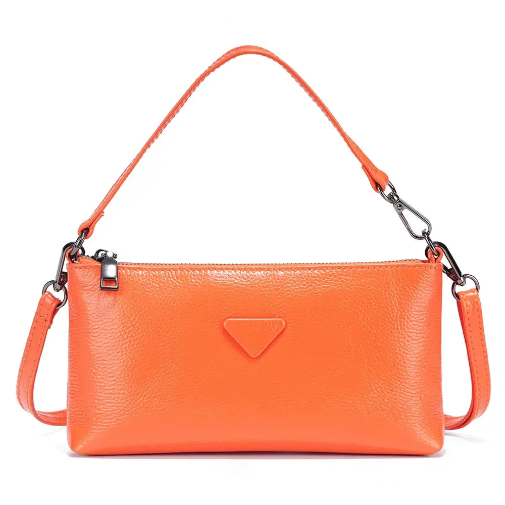 Women’s shoulder bag, orange leather, envelope-style with subtle applique detail for casual and formal occasions.