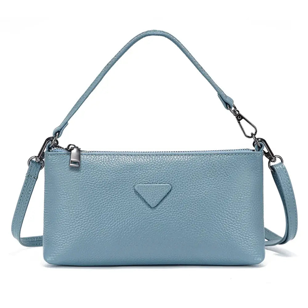 Blue leather shoulder bag with a sleek design, perfect for casual and formal occasions.