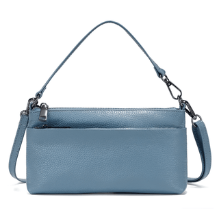 Blue leather shoulder bag, minimalist design, versatile style for women, perfect for any occasion.