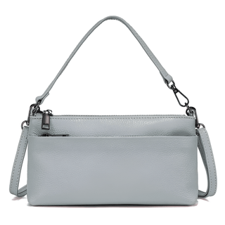 Light blue leather clutch bag with adjustable strap, perfect for a sophisticated, minimalist style.