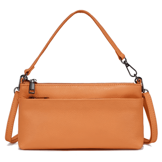 Orange leather shoulder bag with adjustable strap, stylish and versatile for casual and formal occasions.