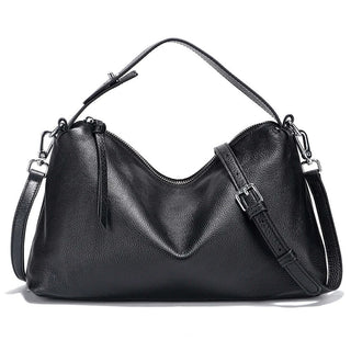Black leather shoulder bag with slouchy design, durable materials, and chic accents for everyday style.