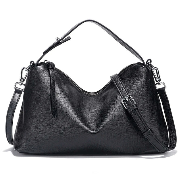 Black leather shoulder bag with slouchy design, durable materials, and chic accents for everyday style.