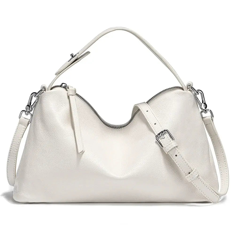 Leather white hobo bag for women, stylish and spacious design with adjustable strap and elegant accents.