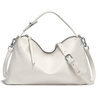 Leather white hobo bag for women, stylish and spacious design with adjustable strap and elegant accents.