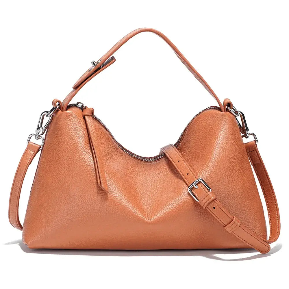 Hobo bag orange leather, handmade with zipper and adjustable strap, perfect for stylish and practical everyday use.