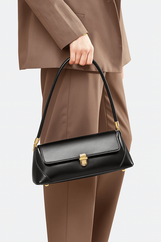 Elegant black leather shoulder bag, perfect for stylish modern women, combining luxury with everyday practicality.
