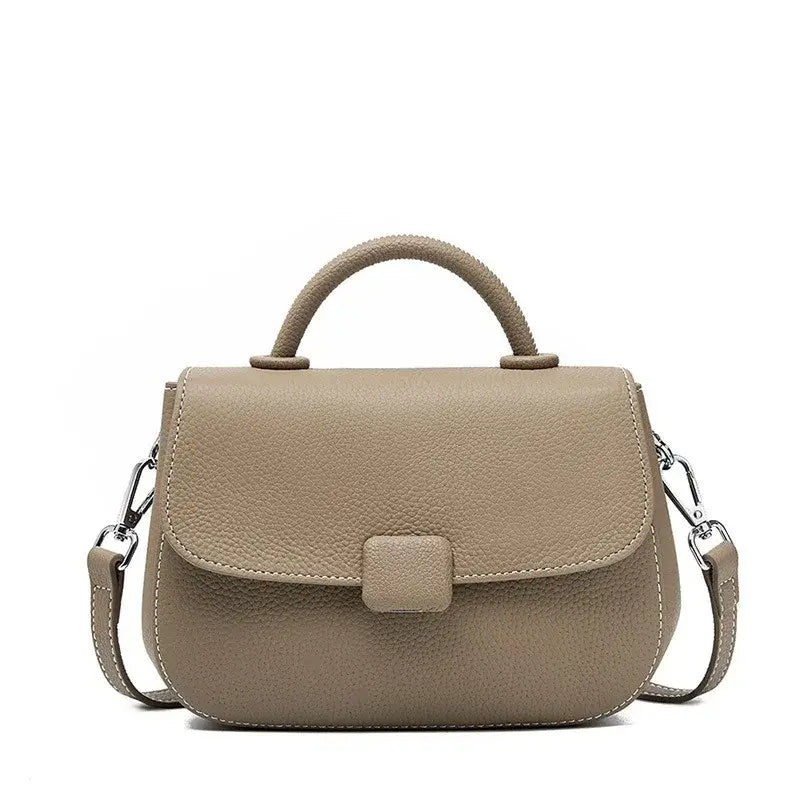 Soft leather shoulder bag in taupe, handmade with a flexible silhouette for stylish everyday use.