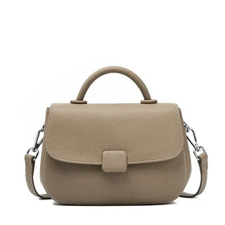 Soft leather shoulder bag in taupe, handmade with a flexible silhouette for stylish everyday use.