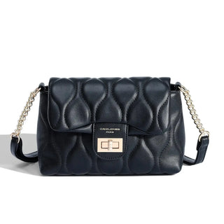 Women's quilted black shoulder bag with chain strap and turn-lock closure, perfect for casual and versatile occasions.