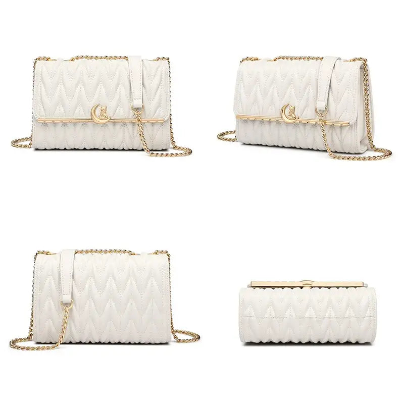 White quilted women’s shoulder bag with gold chain strap and moon cat charm, stylish and modern design.