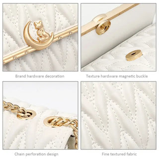 White quilted women's shoulder bag featuring gold chain strap, moon cat charm, and stylish hardware details.