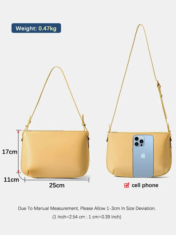 Luxurious yellow shoulder bag, handmade cow leather, stylish with spacious compartments, perfect for women on the go.