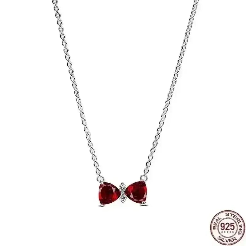 Heart-Shaped Necklace featuring sparkling red zircon stones on a 925 sterling silver chain.