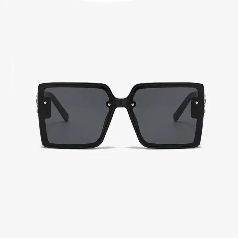 Women's black sunglasses with UV400 lenses, vintage inspired square frame, stylish eyewear by TOYEARN.