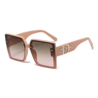 Women's UV400 sunglasses in pink, vintage-inspired square frame design with reinforced metal hinges.