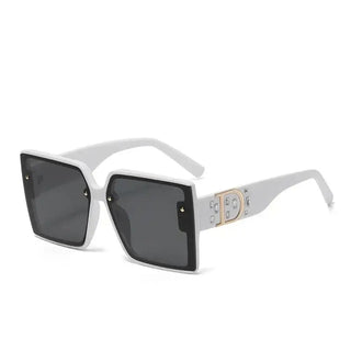 Women's UV400 sunglasses in white with vintage inspired frame and reinforced metal hinges.