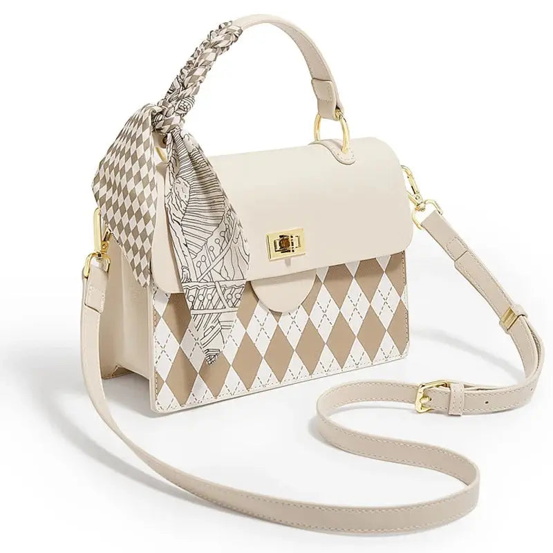 Beige women's top handle bag with diamond pattern, scarf detail, and crossbody strap, stylish and modern bucket design.