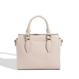 Women's structured tote bag in beige leather with double handles and casual style.