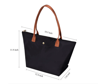 Green women’s tote bag with brown handles and zipper closure, large capacity, stylish for special occasions.