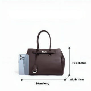 Dark brown leather women's tote bag with top handles, silver lock detail, dimensions: 30cm long, 21cm height, 14cm width.
