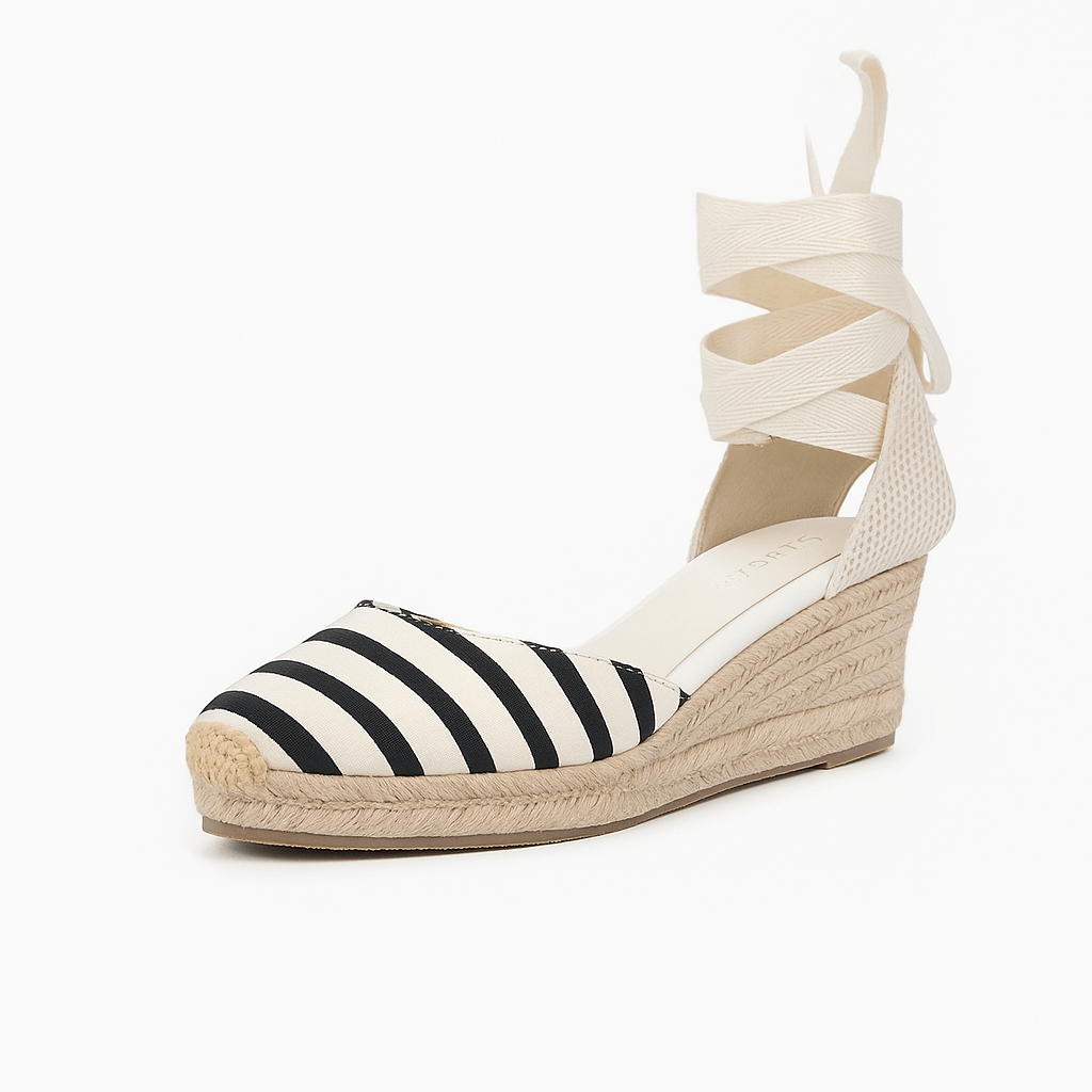 Black and white striped espadrille sandals for women, ankle strap, lace-up design, stylish and comfortable.