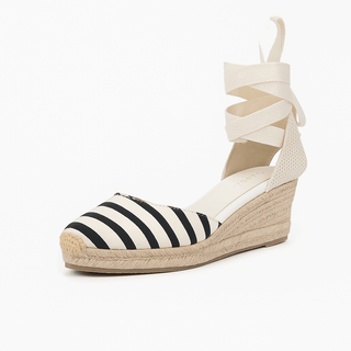 Black and white striped espadrille sandals for women, ankle strap, lace-up design, stylish and comfortable.