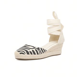 Black and white striped espadrille sandals with ankle strap and lace-up closure for women