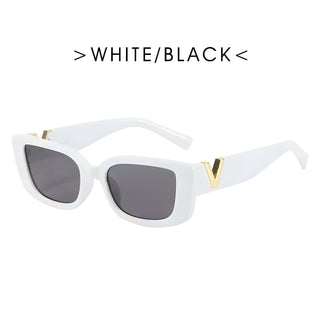 Women’s trendy white and black rectangle sunglasses with UV400 protection and plastic frame.