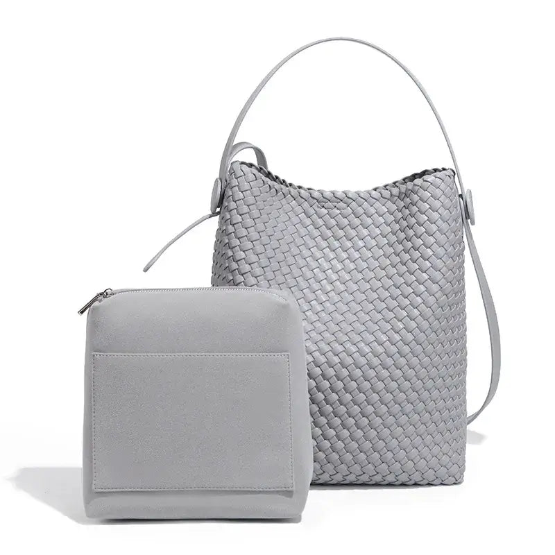 Woven leather bag and matching pouch in light gray, eco-friendly design, perfect for casual or elegant summer outings.